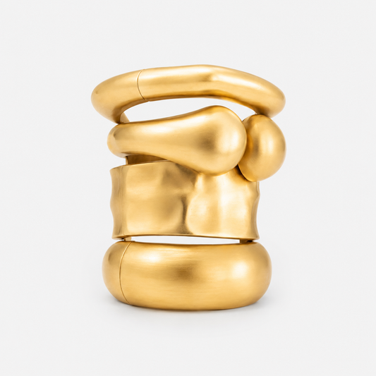 sculptural oversized gold bangle