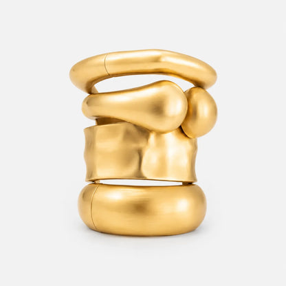 sculptural oversized gold bangle
